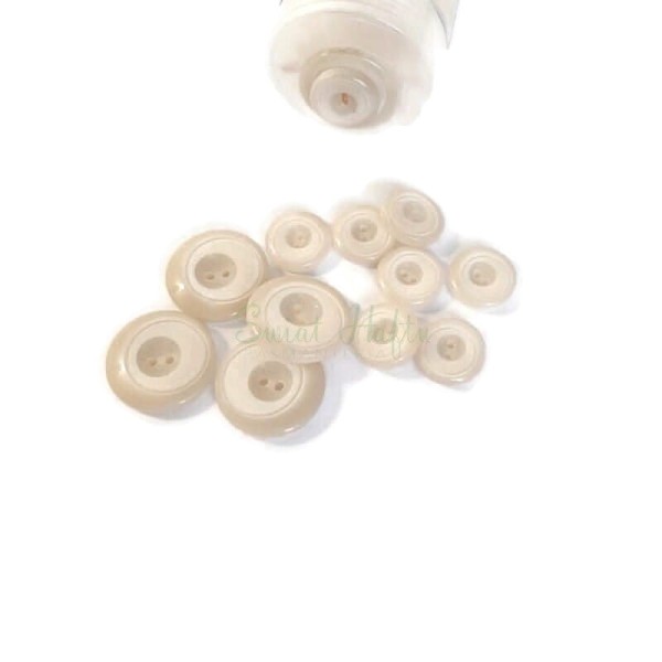 Guzik  23 mm i 15 mm 