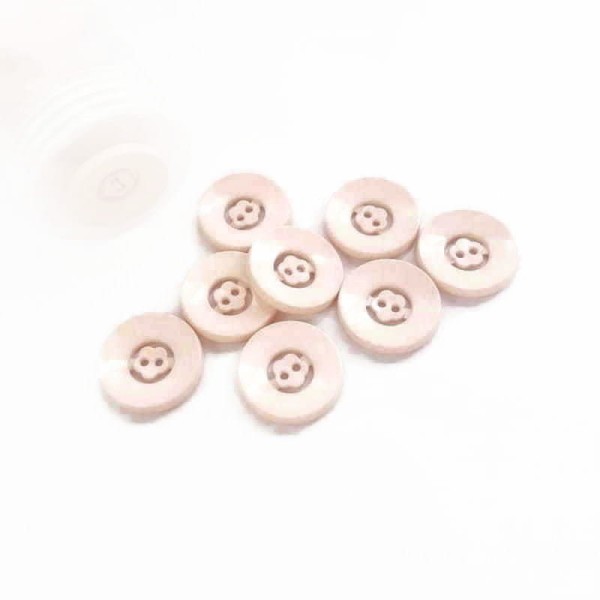 Guzik różowy 23 mm