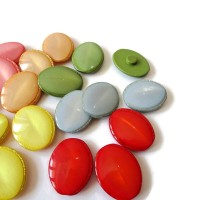 Guzik  perłowy owalny 35 x 28 mm