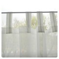 Firanka zazdroska z szyfonu w kolorze kremowym ozdobiona haftem kolorowym w rozmiarze 80 x 150 cm.