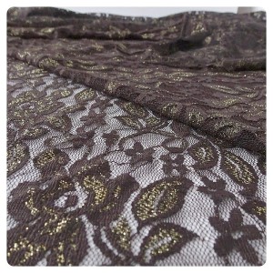 Tkanina koronka, delikatna, lekko elastyczna, ze złotą nitką- szerokość 150 cm- kolor brązowy ze złotą nitką