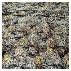 Tkanina koronka delikatna ze złotą nitką, lekko elastyczna- szerokość 150 cm- kolory zielone przeplatane złotą nitką