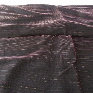 Tkanina dzianina elastyczna w kolorze czarnym w mieniące się pasy, mocno błyszcząca z brokatem, ciężka, lejąca  - szerokość 140 cm  - na stanie: kupon (2,70 mb x ,40 mb) - wyprzedaż