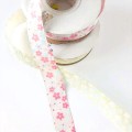Wstążka w kwiatki z tkaniny, do celów zdobniczych. - szerokość wstążki 25 mm, - kolory: żółta - pomarańczowa, - kremowa  w drobne kwiatki (rypsowa)  - różowa w drobne kwiatki (rypsowa)