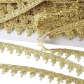 Taśma ozdobna, do celów zdobniczych,  do stosowania w krawiectwie,  w tekstyliach - szerokość 20 mm,  - kolor złoty