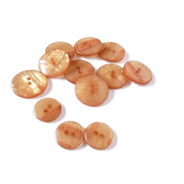 Guzik  25 mm i 17 mm  